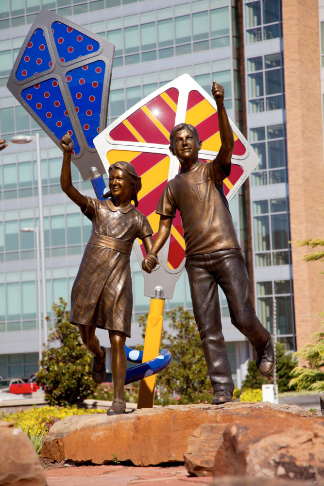 boy and girl flying kites Children's Hospital Sculpture